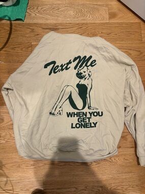 LONELY GHOST Cream Sweatshirt with Dark Green Graphic